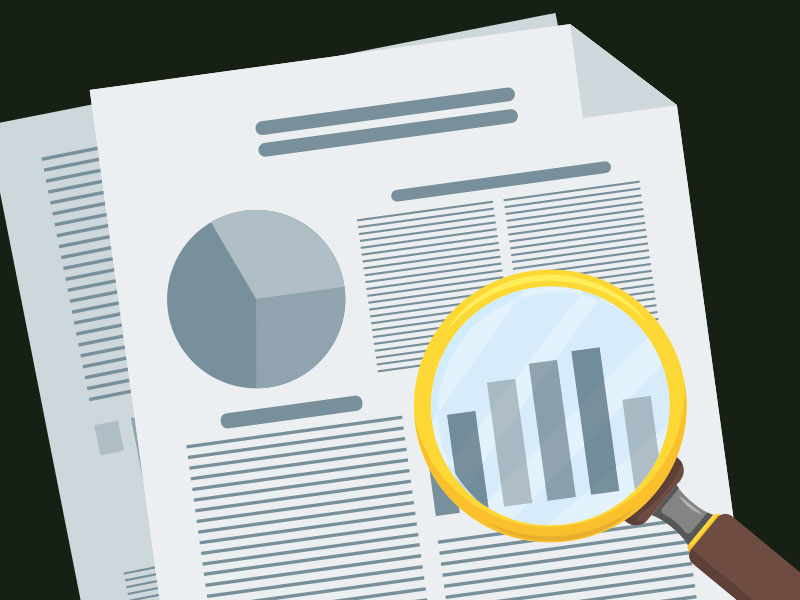 compliance Some papers with words and graphs being inspected under a magnifying glass.