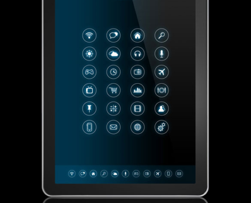 A computer tablet displaying a grid of application icons.